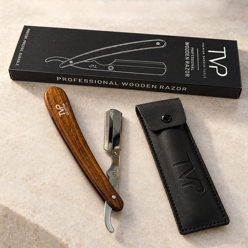 TVP Heritage walnut shavette razor with storage pouch and TVP box on a marble surface